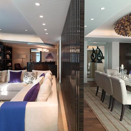 Millennium Al Rawdah Hotel Abu Dhabi Restaurant photo Interior design of a modern apartment