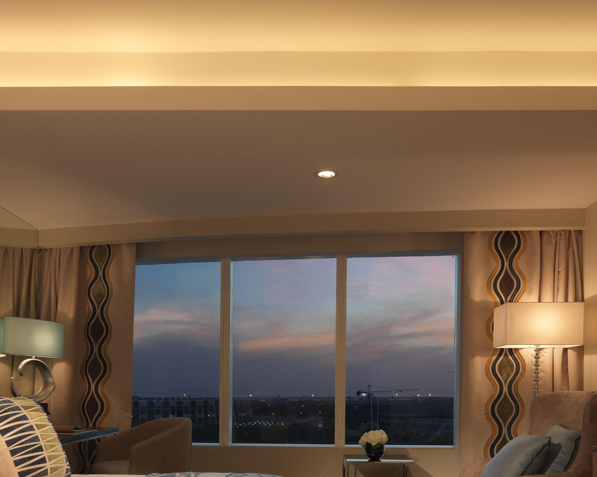 Millennium Al Rawdah Hotel Abu Dhabi Exterior photo A view of the skyline from a room at the Four Seasons Hotel in Seoul, South Korea.