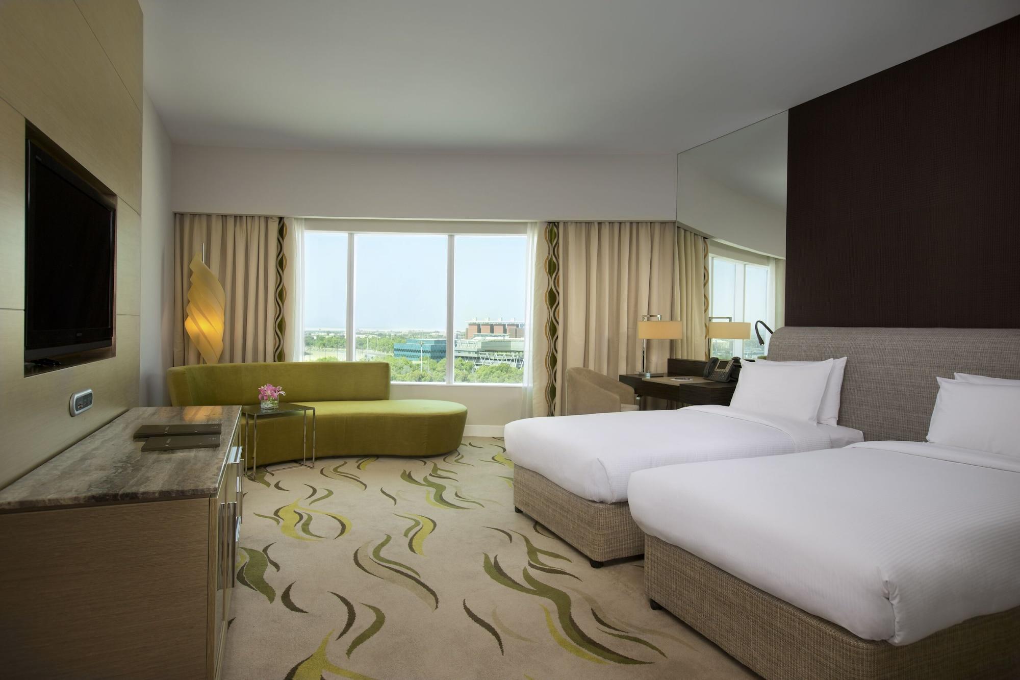Millennium Al Rawdah Hotel Abu Dhabi Exterior photo A room at the hotel