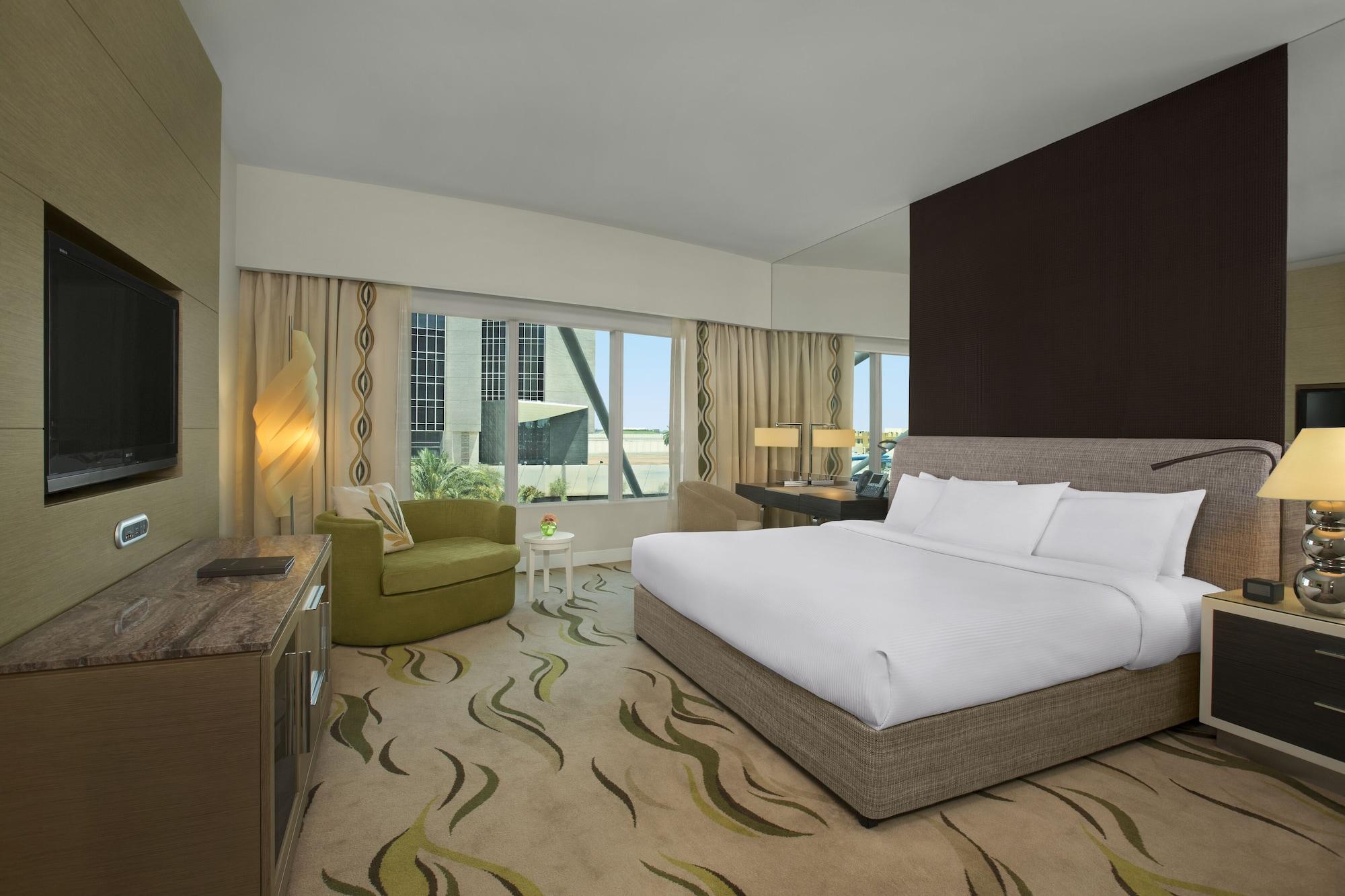 Millennium Al Rawdah Hotel Abu Dhabi Exterior photo A room at the hotel