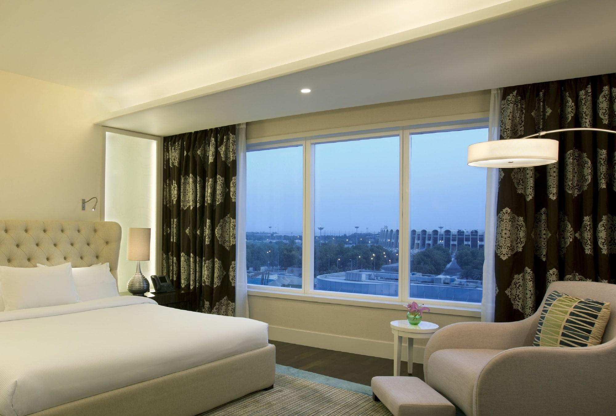 Millennium Al Rawdah Hotel Abu Dhabi Exterior photo A view of the hotel from a guest room