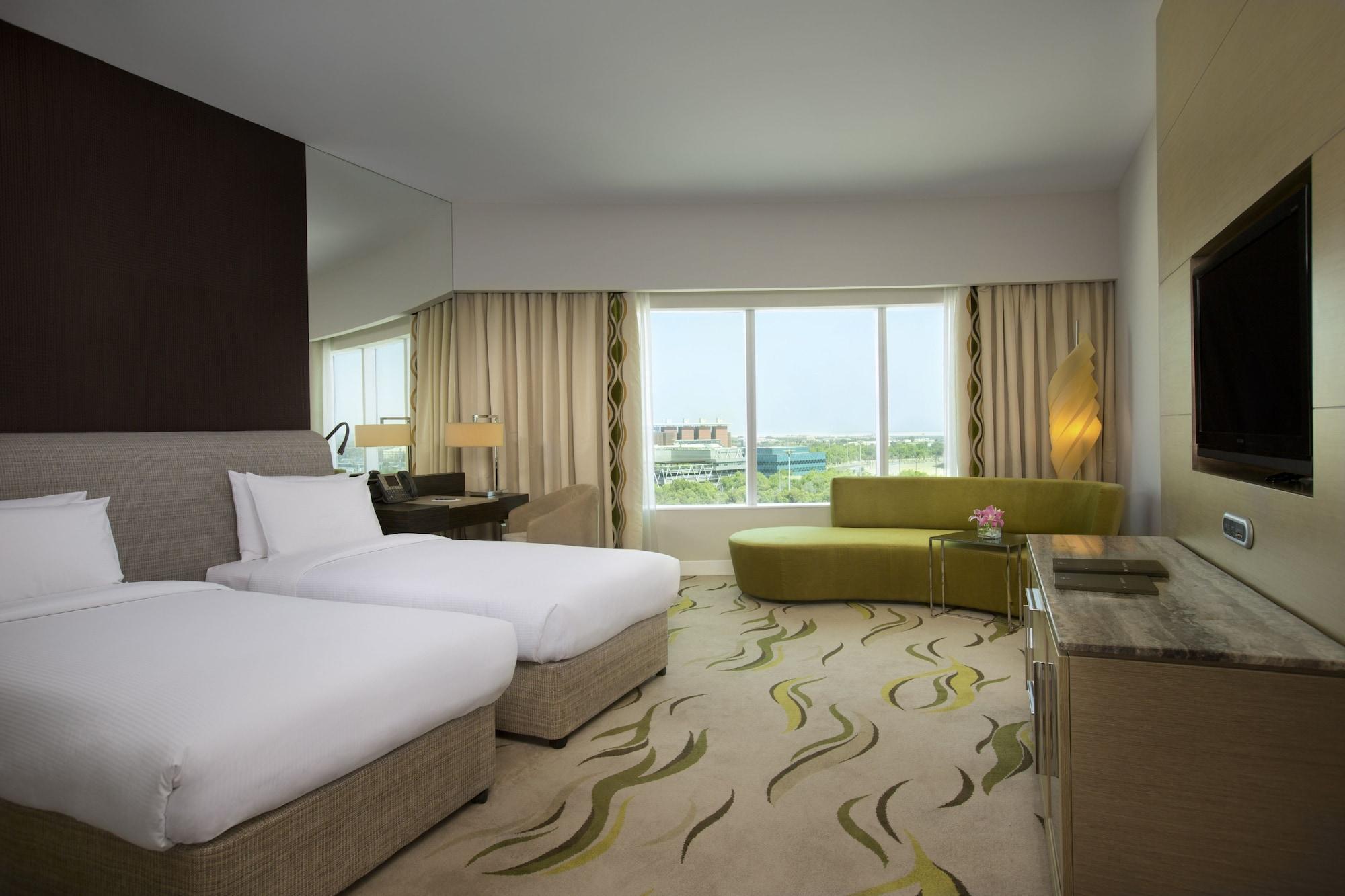 Millennium Al Rawdah Hotel Abu Dhabi Exterior photo A room at the hotel