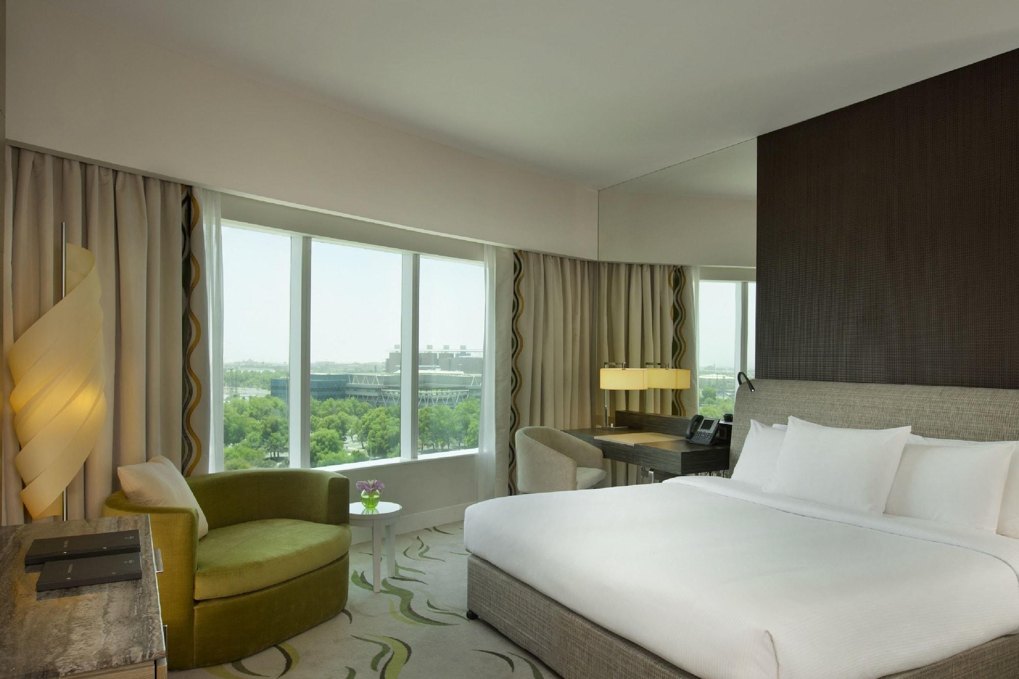Millennium Al Rawdah Hotel Abu Dhabi Exterior photo A room at the hotel