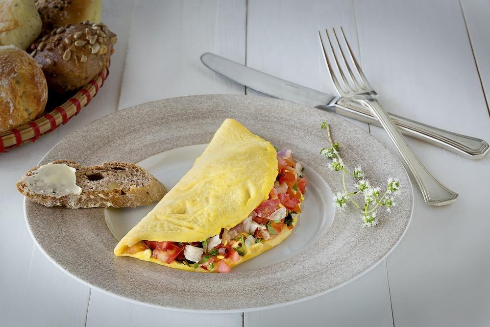 Millennium Al Rawdah Hotel Abu Dhabi Exterior photo Omelette