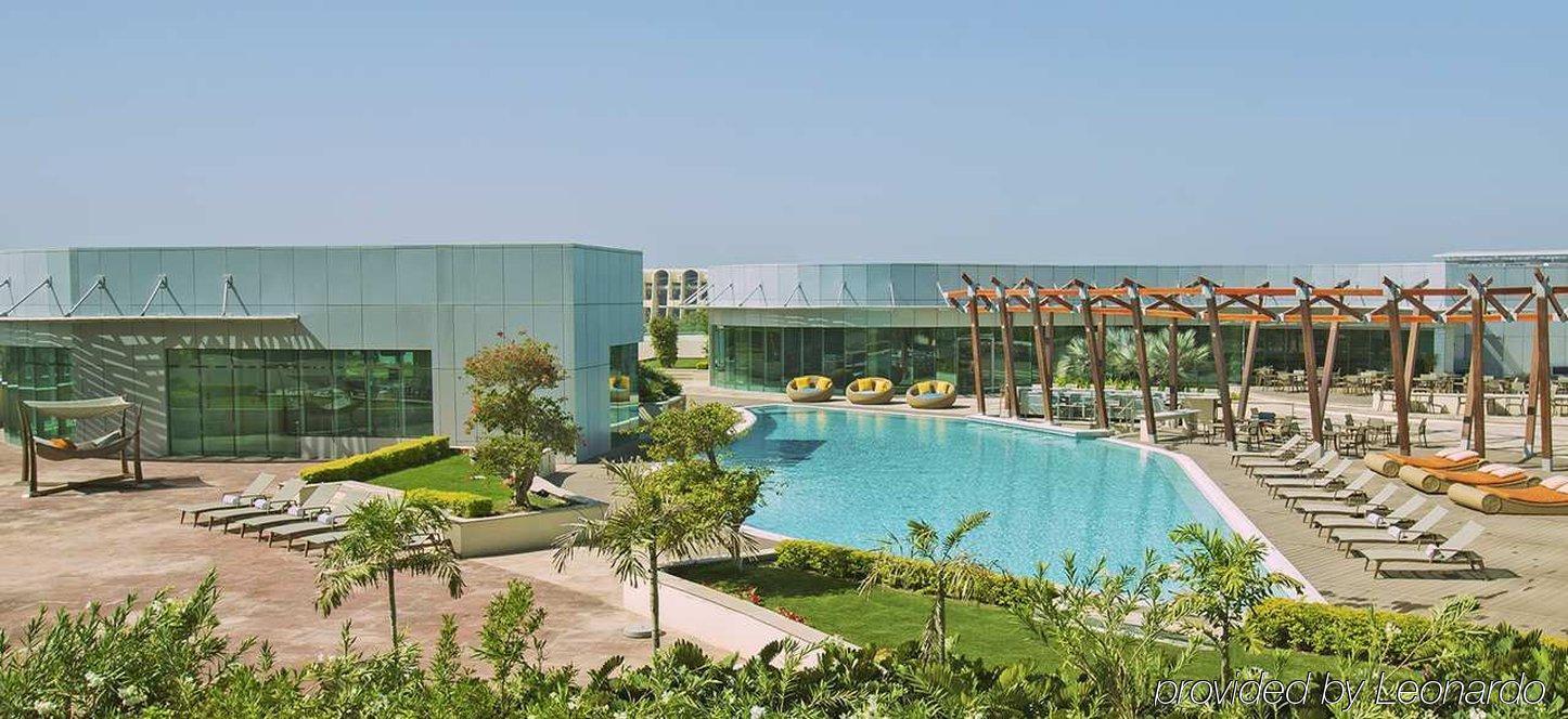 Millennium Al Rawdah Hotel Abu Dhabi Exterior photo The hotel pool
