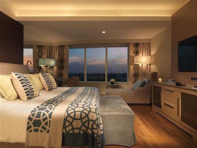 Millennium Al Rawdah Hotel Abu Dhabi Exterior photo A room at the hotel