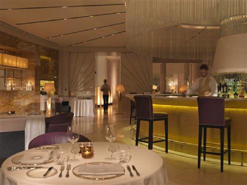 Millennium Al Rawdah Hotel Abu Dhabi Exterior photo The restaurant's interior