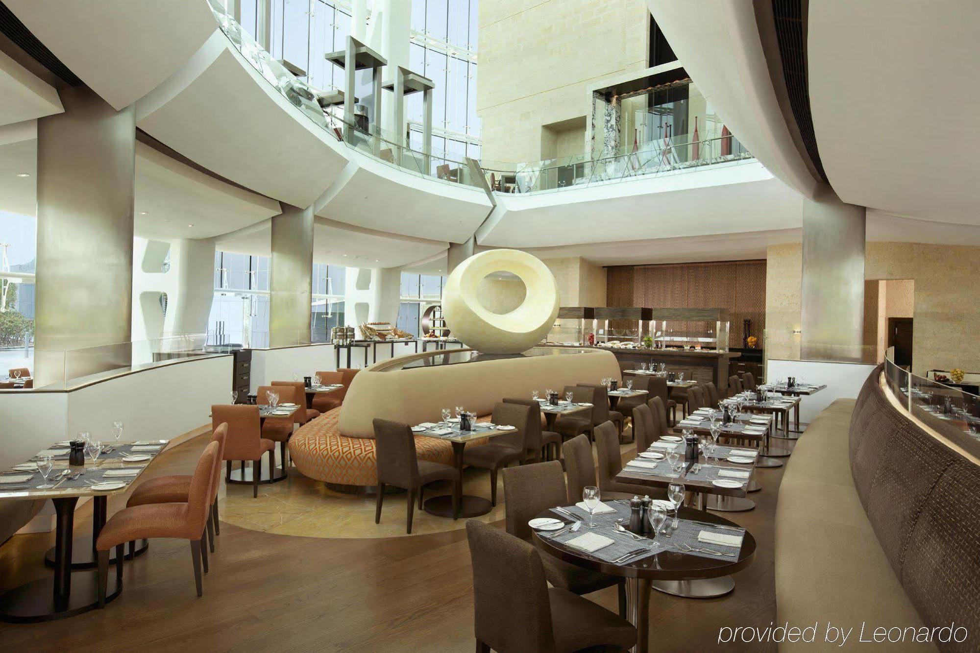 Millennium Al Rawdah Hotel Abu Dhabi Exterior photo The restaurant