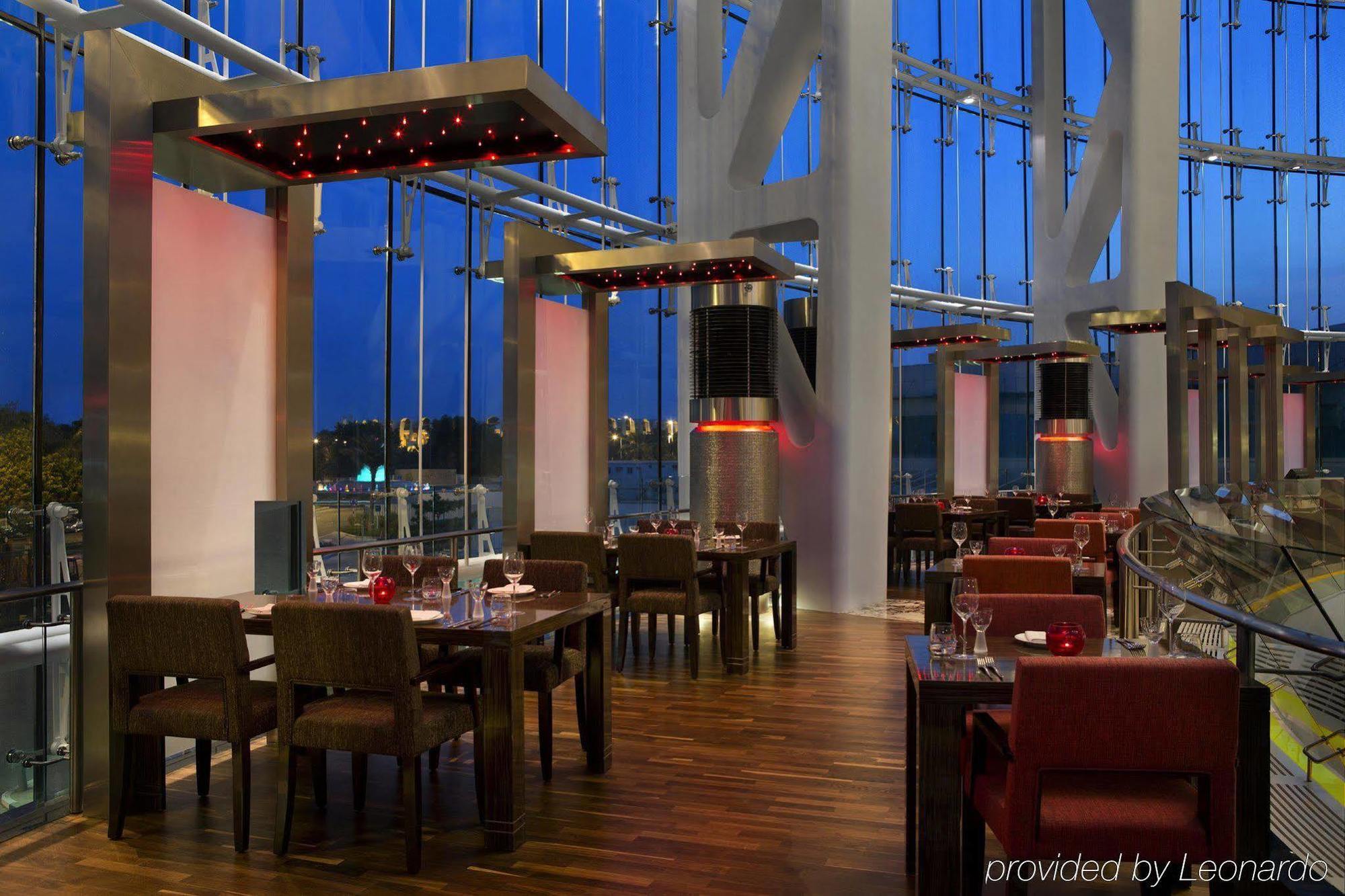 Millennium Al Rawdah Hotel Abu Dhabi Exterior photo The interior of the restaurant