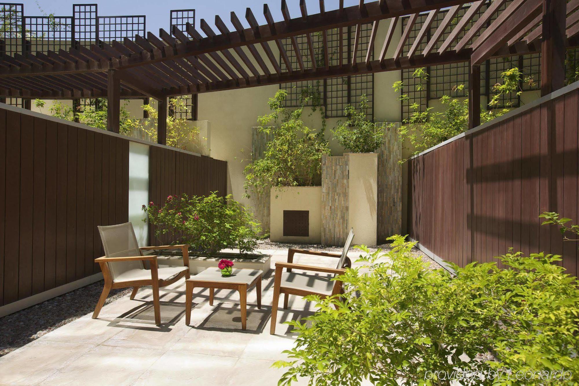 Millennium Al Rawdah Hotel Abu Dhabi Exterior photo The patio of the hotel