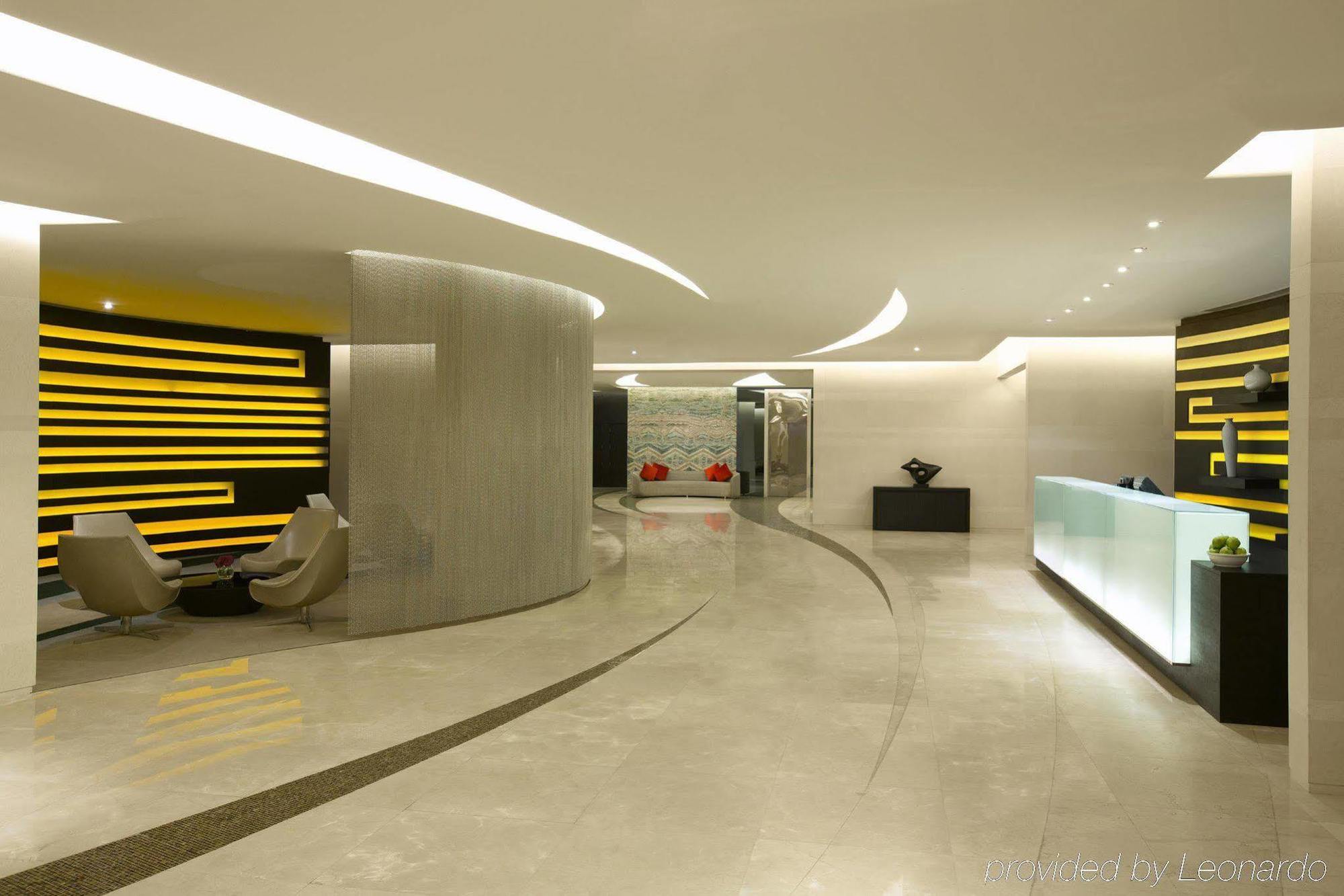 Millennium Al Rawdah Hotel Abu Dhabi Exterior photo The reception area of the hotel