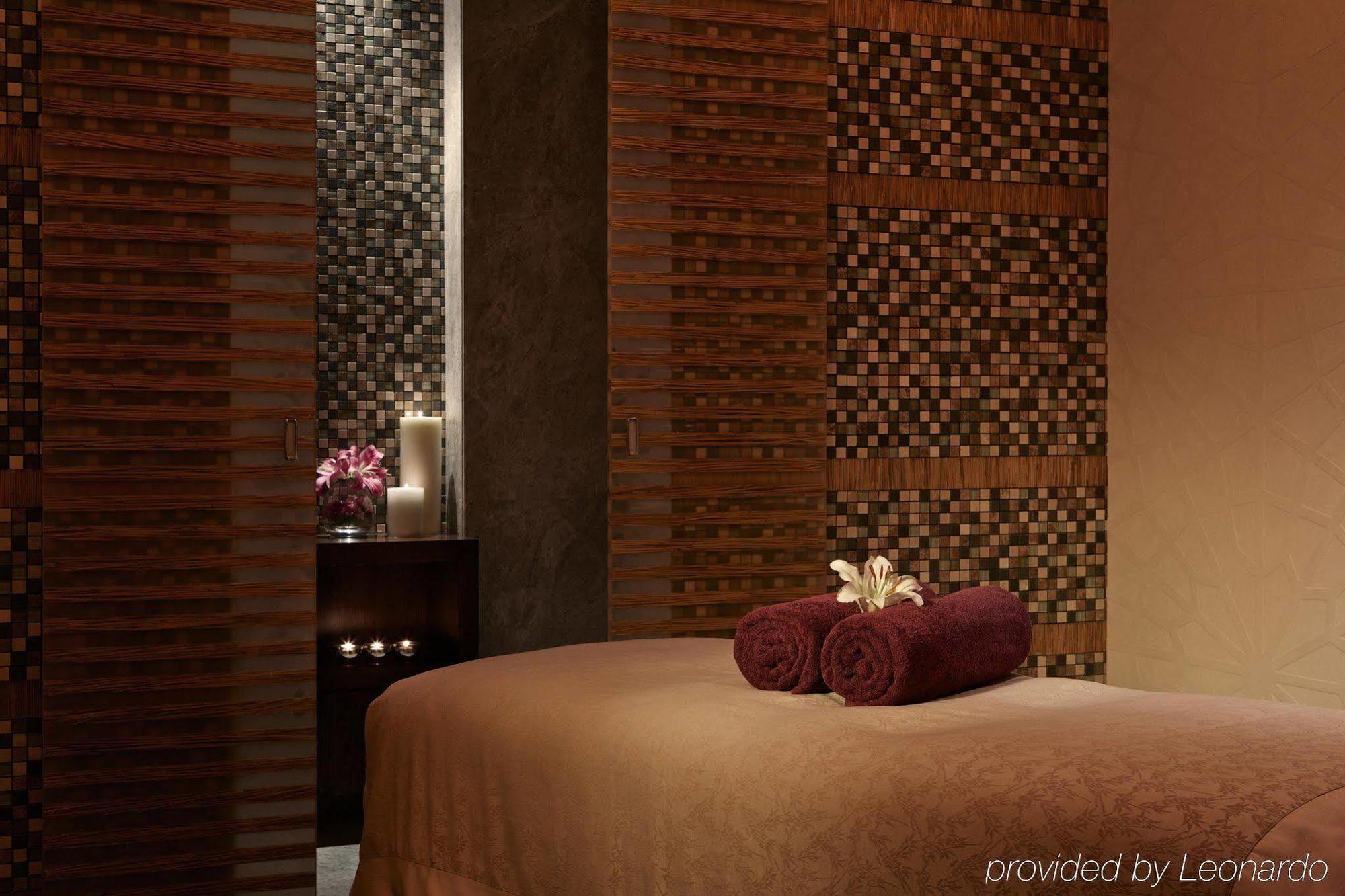 Millennium Al Rawdah Hotel Abu Dhabi Exterior photo A massage table at a luxury spa