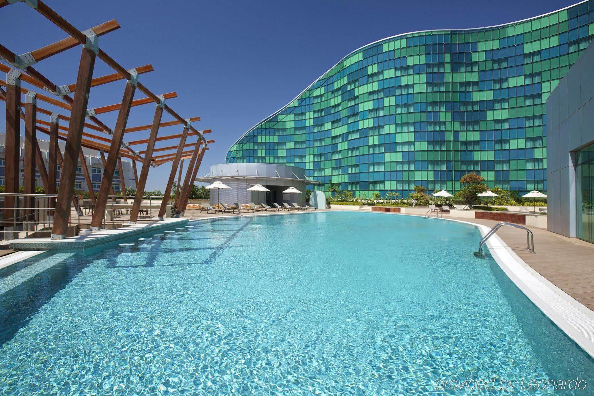Millennium Al Rawdah Hotel Abu Dhabi Exterior photo The pool at the Jumeirah Jumeirah