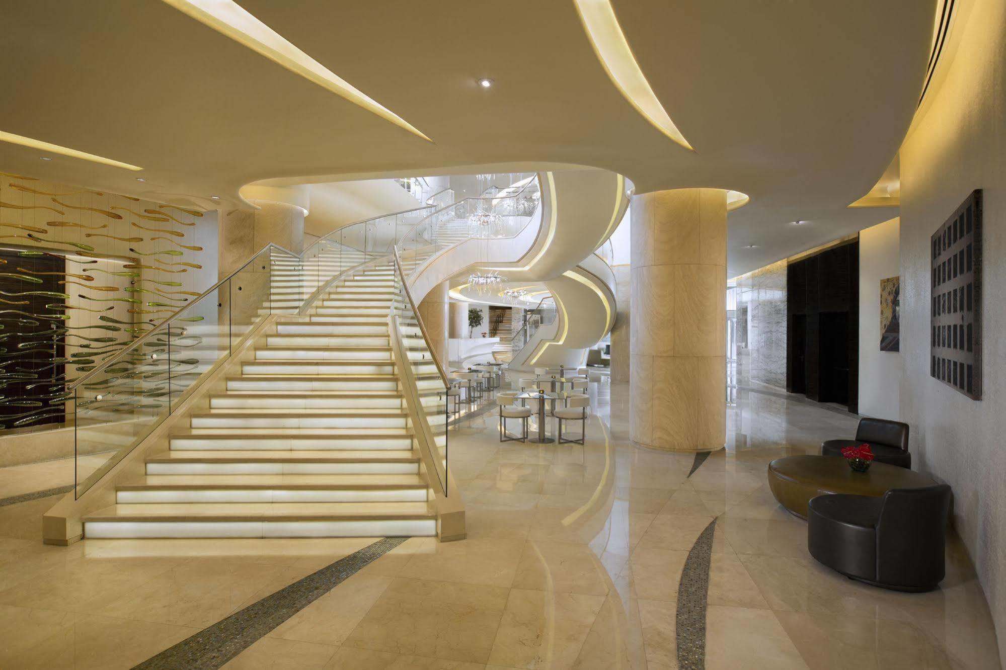 Millennium Al Rawdah Hotel Abu Dhabi Exterior photo The hotel's lobby