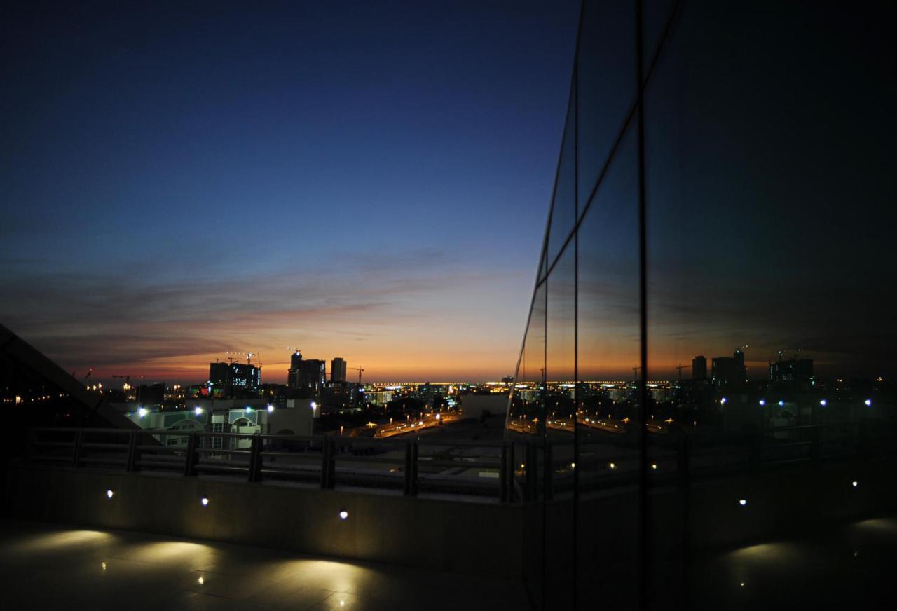 Millennium Al Rawdah Hotel Abu Dhabi Exterior photo The view from the top of the Sky Deck at the top of the Sky Tower