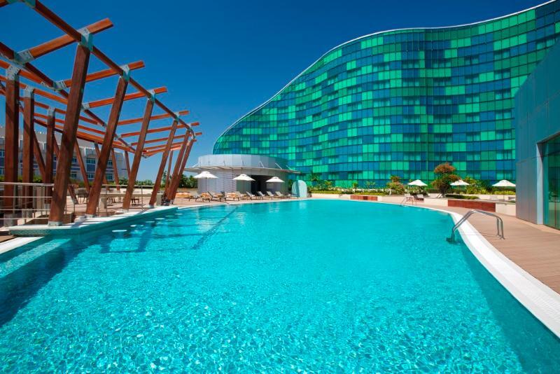Millennium Al Rawdah Hotel Abu Dhabi Exterior photo The pool at the hotel