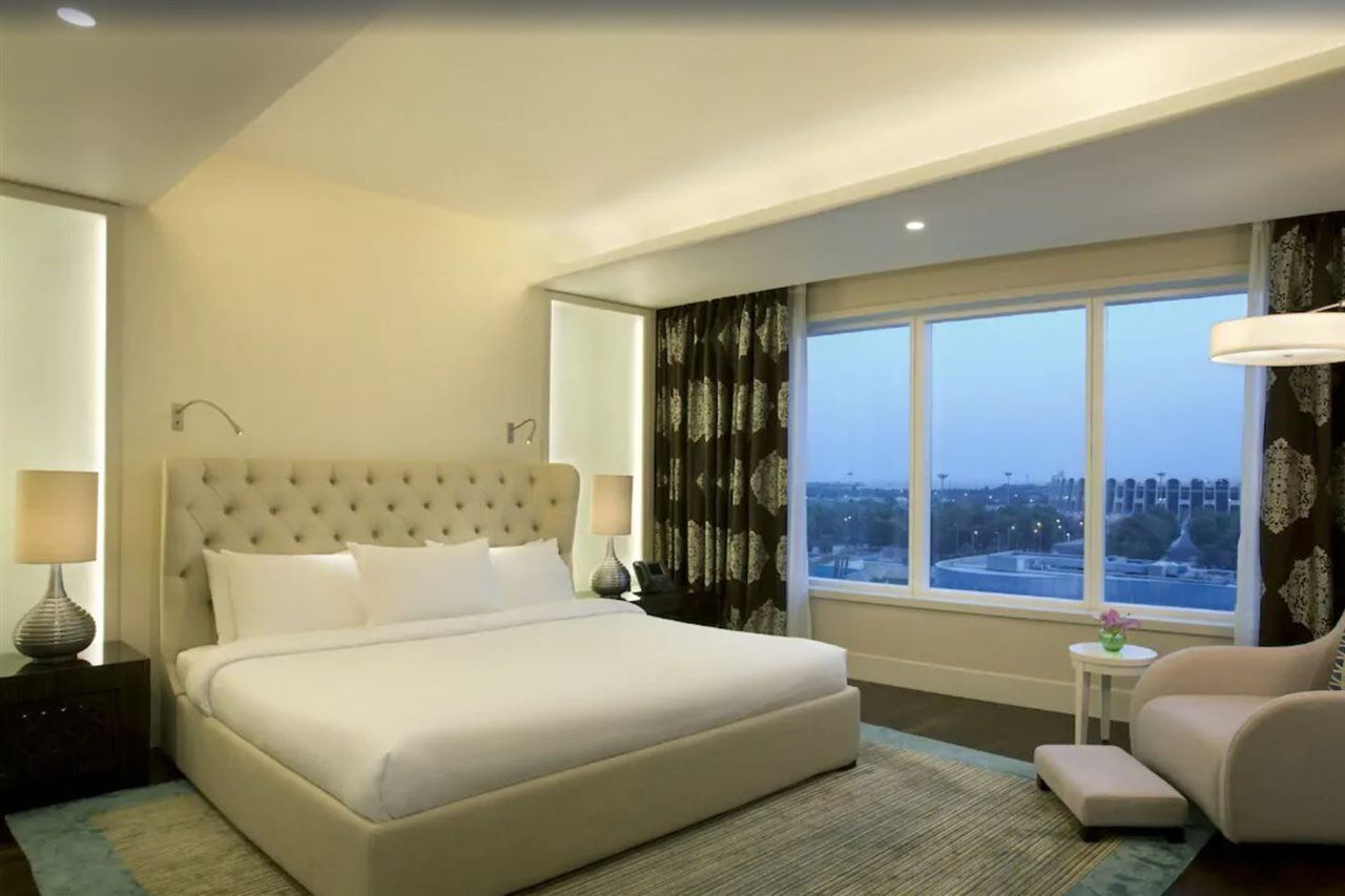 Millennium Al Rawdah Hotel Abu Dhabi Exterior photo A room at the hotel